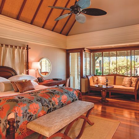 Constance Prince Maurice Poste de Flacq Habitación foto A bedroom at the Four Seasons Resort