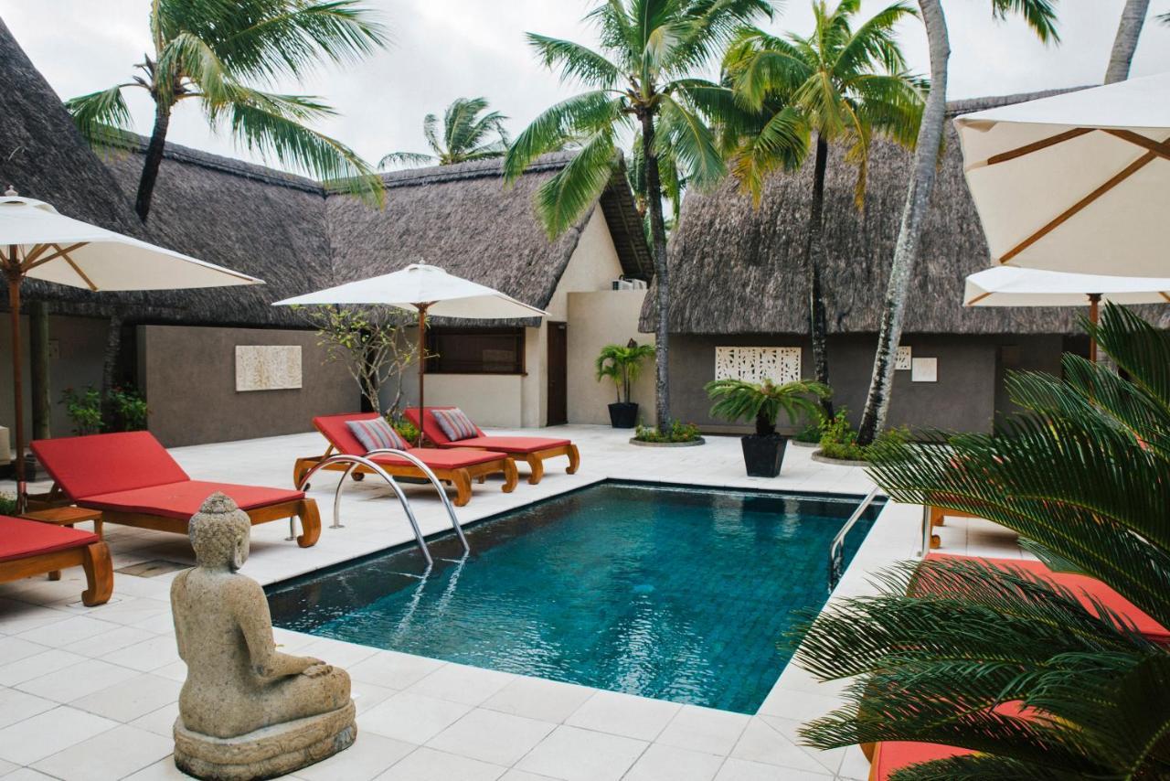 Constance Prince Maurice Poste de Flacq Exterior foto A pool at the resort